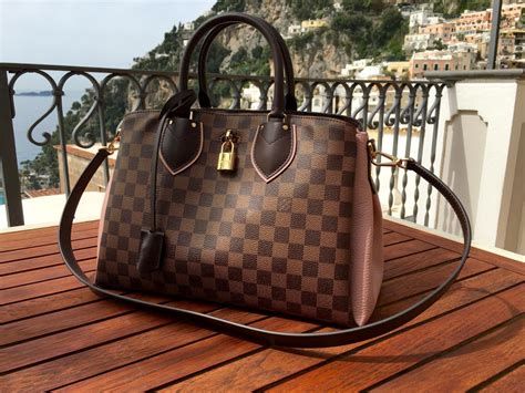 louis vuitton hand luggage fake|Louis Vuitton bag scam.